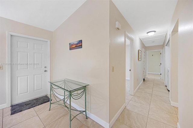 547 Heck, Little Torch Key, FL 33042 - hallway with light tile patterned floors and vaulted ceiling