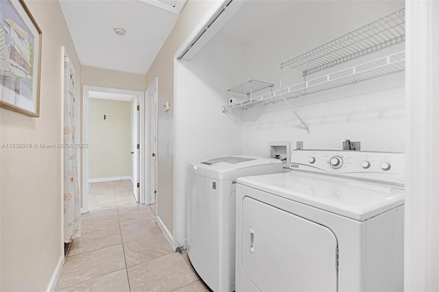 547 Heck, Little Torch Key, FL 33042 - laundry area featuring washer and clothes dryer and light tile patterned flooring