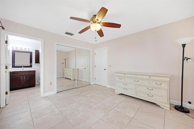547 Heck, Little Torch Key, FL 33042 - unfurnished bedroom featuring light tile patterned flooring, a ceiling fan, and ensuite bathroom