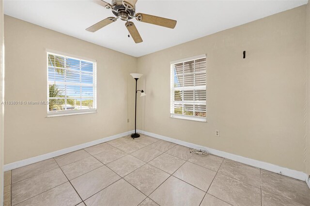 547 Heck, Little Torch Key, FL 33042 - empty room with ceiling fan and light tile patterned floors