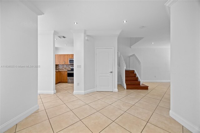 15057 SW 9th Ter, Miami, FL 33194 - unfurnished living room featuring light tile patterned flooring, stairs, recessed lighting, and crown molding