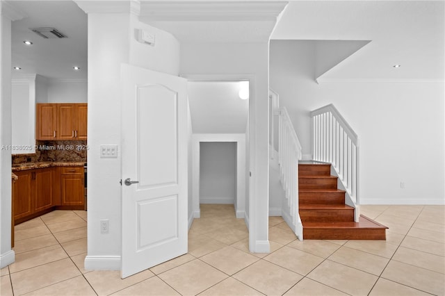 15057 SW 9th Ter, Miami, FL 33194 - stairway featuring tile patterned flooring, crown molding, and recessed lighting