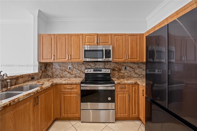 15057 SW 9th Ter, Miami, FL 33194 - kitchen featuring stainless steel appliances, ornamental molding, backsplash, and light tile patterned floors