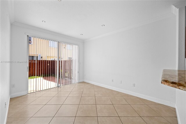 15057 SW 9th Ter, Miami, FL 33194 - spare room with ornamental molding, healthy amount of natural light, and tile patterned flooring
