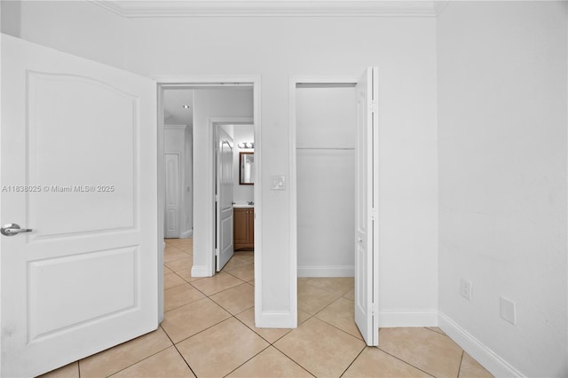 15057 SW 9th Ter, Miami, FL 33194 - unfurnished bedroom with light tile patterned flooring, a closet, and ornamental molding
