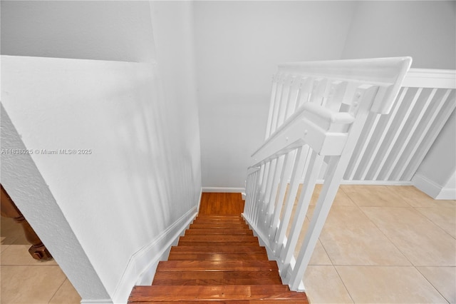 15057 SW 9th Ter, Miami, FL 33194 - staircase featuring baseboards and tile patterned flooring