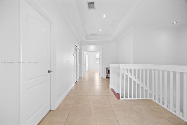 15057 SW 9th Ter, Miami, FL 33194 - hallway with arched walkways, light tile patterned flooring, ornamental molding, an upstairs landing, and recessed lighting