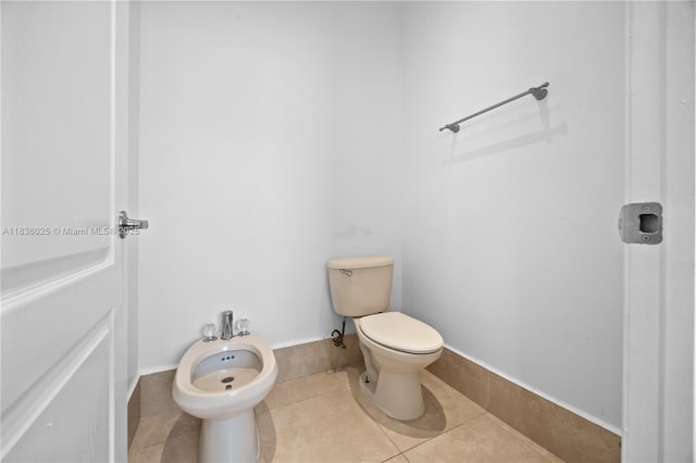 15057 SW 9th Ter, Miami, FL 33194 - bathroom with a bidet and tile patterned flooring