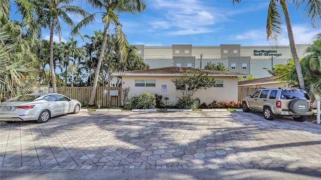 1348 Holly Heights Dr Unit 17, Fort Lauderdale, FL 33304 - view of building exterior with uncovered parking