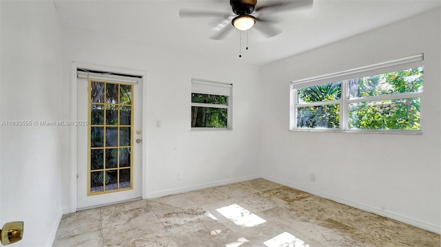 1348 Holly Heights Dr Unit 17, Fort Lauderdale, FL 33304 - unfurnished room featuring baseboards and a ceiling fan