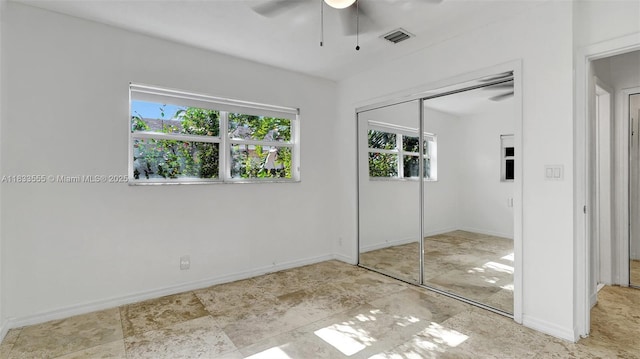 1348 Holly Heights Dr Unit 17, Fort Lauderdale, FL 33304 - unfurnished bedroom featuring a closet and a ceiling fan