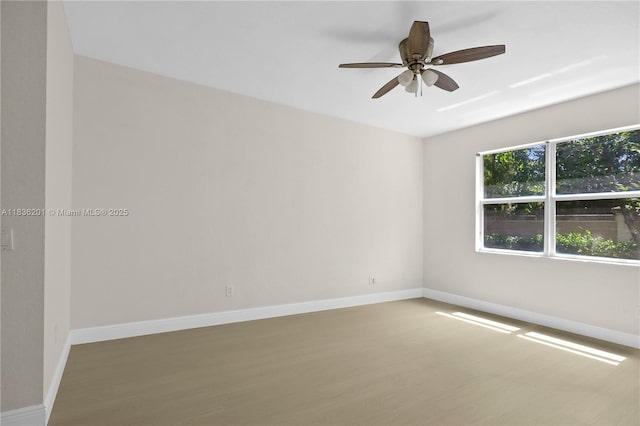 798 Quartz Ter, Palm Beach, FL 33413 - spare room with wood finished floors and ceiling fan