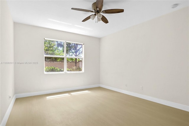 798 Quartz Ter, Palm Beach, FL 33413 - unfurnished room featuring ceiling fan, wood finished floors, and a smoke detector
