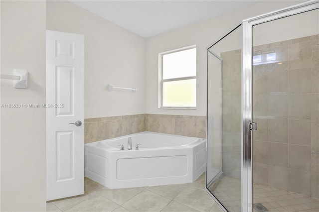 798 Quartz Ter, Palm Beach, FL 33413 - bathroom with a garden tub, a stall shower, and tile patterned flooring