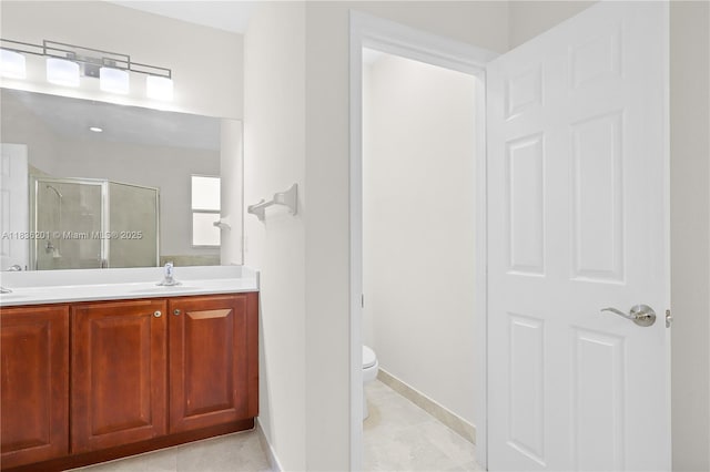 798 Quartz Ter, Palm Beach, FL 33413 - full bathroom with a shower stall, double vanity, and tile patterned floors
