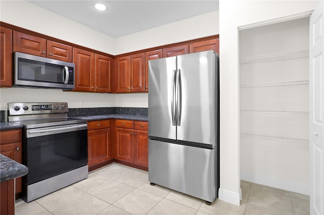798 Quartz Ter, Palm Beach, FL 33413 - kitchen with stainless steel appliances, light tile patterned flooring, and recessed lighting
