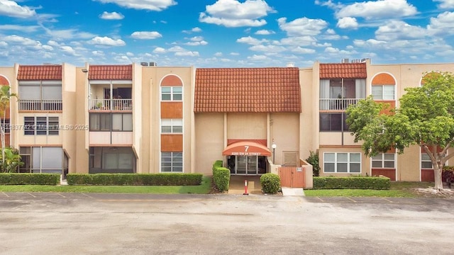 8280 SW 24th St Unit 7105, North Lauderdale, FL 33068 - view of property with uncovered parking