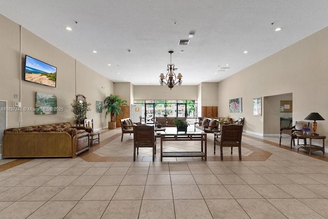 8280 SW 24th St Unit 7105, North Lauderdale, FL 33068 - dining room featuring light tile patterned floors, a towering ceiling, a chandelier, and recessed lighting
