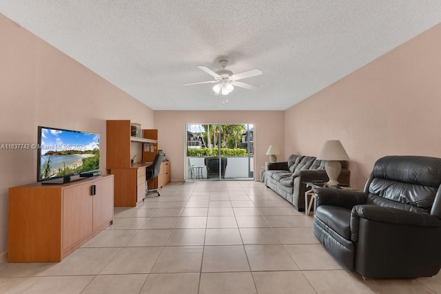 8280 SW 24th St Unit 7105, North Lauderdale, FL 33068 - living room featuring a ceiling fan, a textured ceiling, light tile patterned flooring, and a desk
