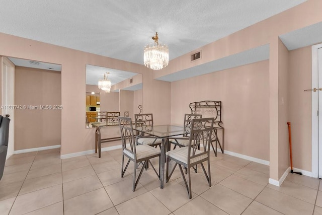 8280 SW 24th St Unit 7105, North Lauderdale, FL 33068 - dining area featuring a chandelier, light tile patterned floors, and a textured ceiling