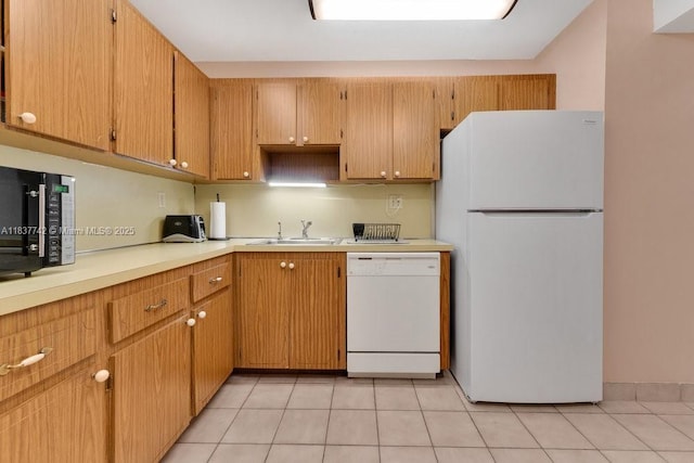 8280 SW 24th St Unit 7105, North Lauderdale, FL 33068 - kitchen featuring white appliances, light countertops, and light tile patterned flooring