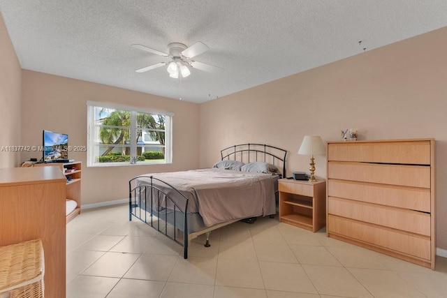 8280 SW 24th St Unit 7105, North Lauderdale, FL 33068 - bedroom featuring a textured ceiling, light tile patterned flooring, and ceiling fan
