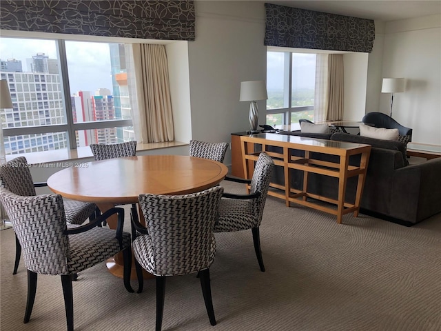 1435 Brickell Ave Unit 3106, Miami, FL 33131 - carpeted dining space featuring a view of city