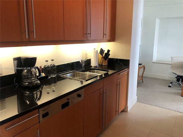 1435 Brickell Ave Unit 3106, Miami, FL 33131 - kitchen with dishwashing machine, light carpet, and dark countertops