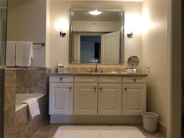 1435 Brickell Ave Unit 3106, Miami, FL 33131 - bathroom with vanity and a bathtub