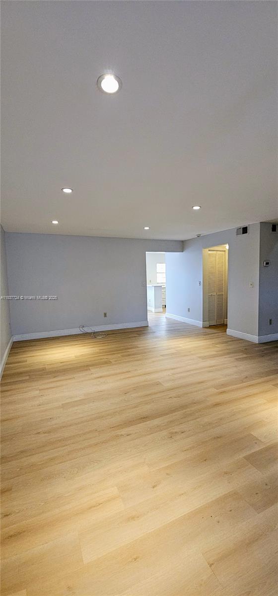 10194 SW 137th Ct Unit 10194, Miami, FL 33186 - empty room featuring recessed lighting and light wood finished floors