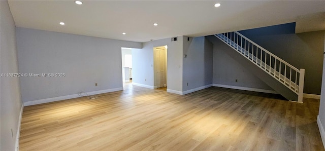 10194 SW 137th Ct Unit 10194, Miami, FL 33186 - unfurnished room featuring recessed lighting, wood finished floors, and stairway