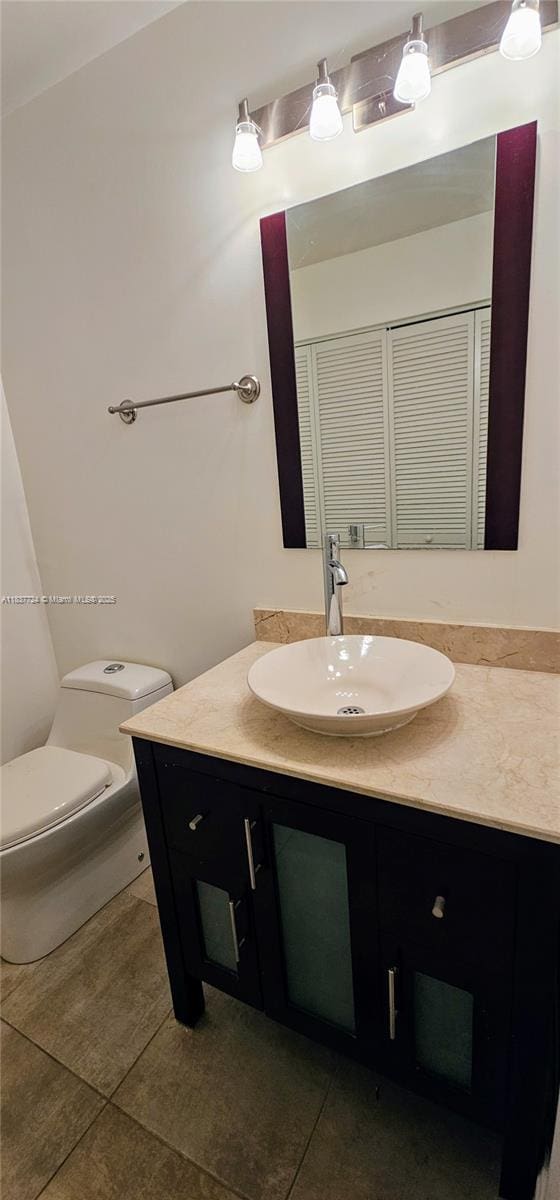 10194 SW 137th Ct Unit 10194, Miami, FL 33186 - bathroom featuring vanity, tile patterned floors, and a closet