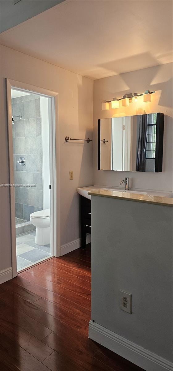 10194 SW 137th Ct Unit 10194, Miami, FL 33186 - full bath featuring hardwood / wood-style flooring, vanity, and a tile shower