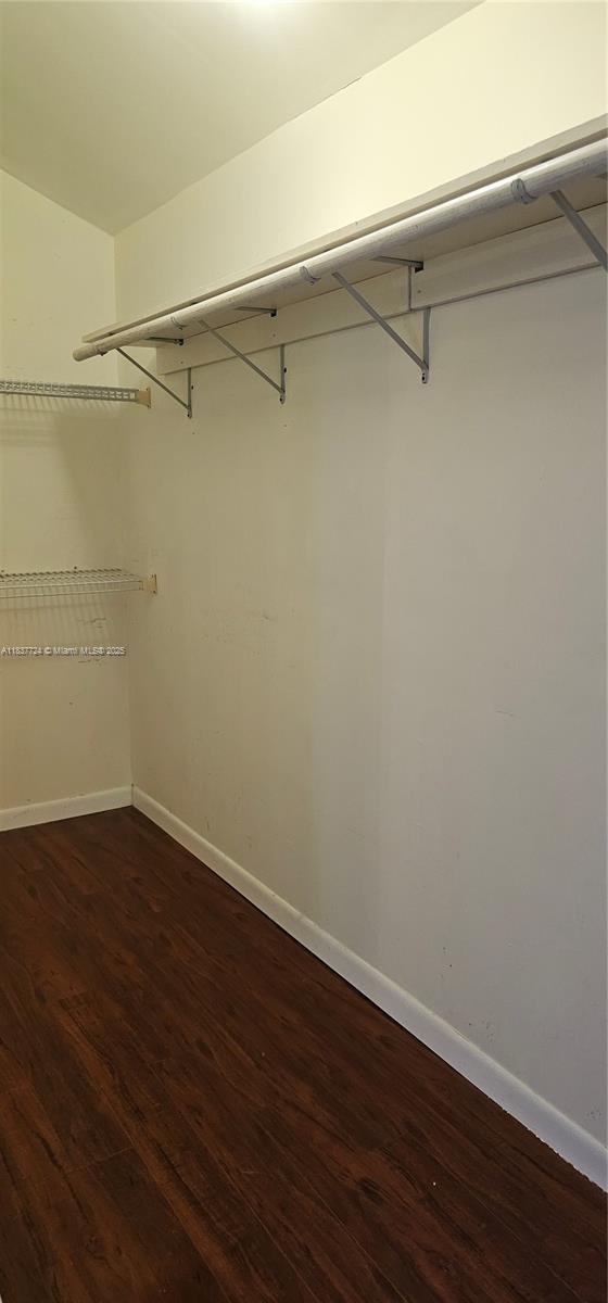 10194 SW 137th Ct Unit 10194, Miami, FL 33186 - walk in closet with wood finished floors