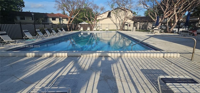 10194 SW 137th Ct Unit 10194, Miami, FL 33186 - community pool with a residential view and a patio area