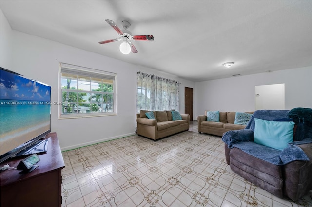 190 E 16th St, Hialeah, FL 33010 - living area featuring ceiling fan and baseboards