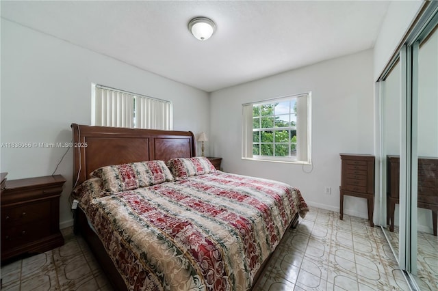 190 E 16th St, Hialeah, FL 33010 - bedroom featuring baseboards and a closet