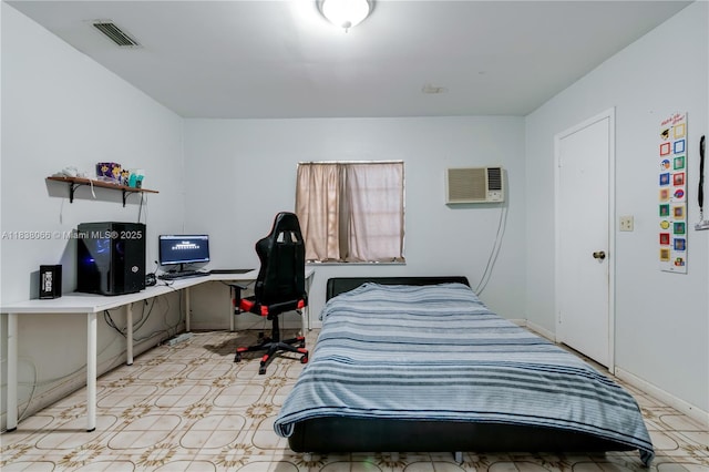 190 E 16th St, Hialeah, FL 33010 - bedroom with a wall mounted air conditioner and a desk