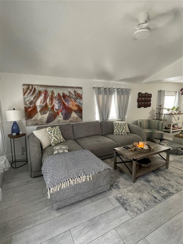 291 NW 95th St, Miami, FL 33150 - living room featuring vaulted ceiling and wood finished floors