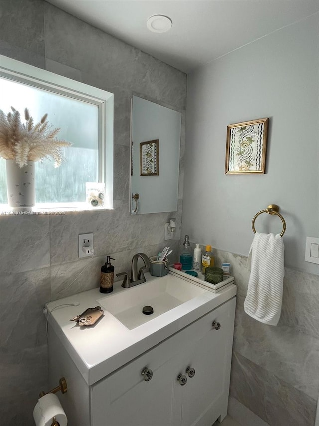 291 NW 95th St, Miami, FL 33150 - bathroom featuring tile walls and vanity