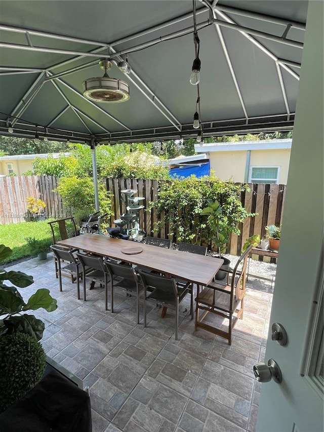 291 NW 95th St, Miami, FL 33150 - view of patio featuring outdoor dining area