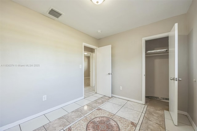 1160 NW 47th Ave, Lauderhill, FL 33313 - unfurnished bedroom featuring a closet and baseboards