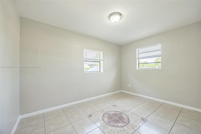 1160 NW 47th Ave, Lauderhill, FL 33313 - unfurnished room featuring light tile patterned floors and baseboards