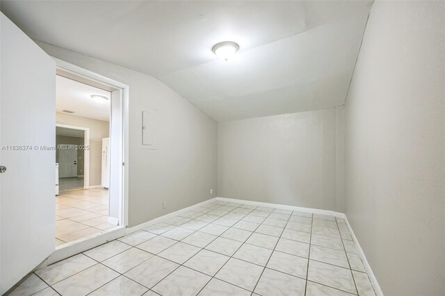 1160 NW 47th Ave, Lauderhill, FL 33313 - additional living space with vaulted ceiling and light tile patterned floors