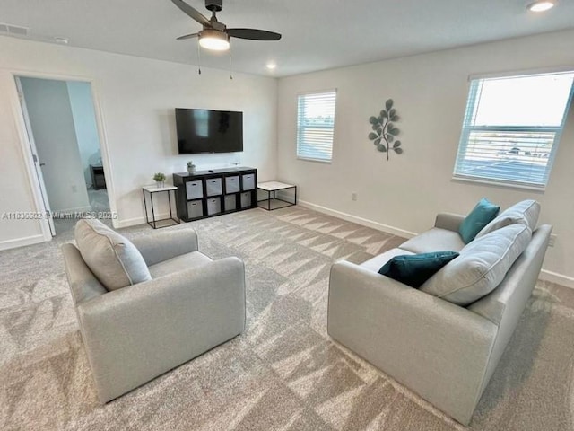 9338 Sommerset Hls, Kissimmee, FL 33896 - carpeted living area with ceiling fan and recessed lighting