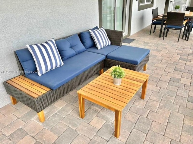 9338 Sommerset Hls, Kissimmee, FL 33896 - view of patio / terrace featuring outdoor dining space and outdoor lounge area