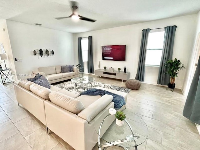 9338 Sommerset Hls, Kissimmee, FL 33896 - living room featuring a ceiling fan