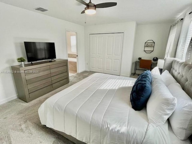 9338 Sommerset Hls, Kissimmee, FL 33896 - bedroom featuring carpet, a closet, and ceiling fan