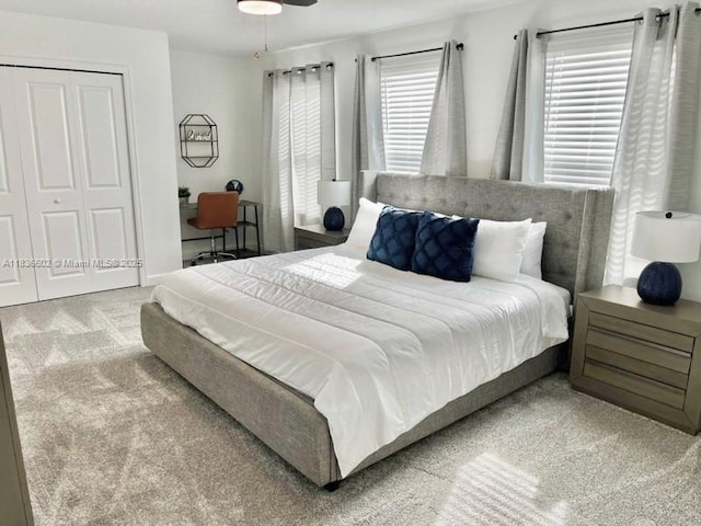 9338 Sommerset Hls, Kissimmee, FL 33896 - carpeted bedroom featuring a closet and ceiling fan