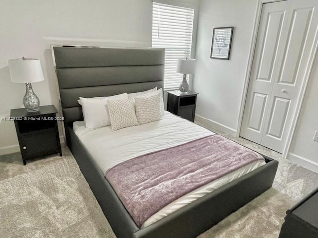 9338 Sommerset Hls, Kissimmee, FL 33896 - carpeted bedroom featuring baseboards and a closet